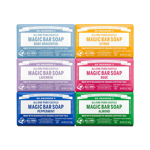 Set of Dr. Bronner's Magic Bar Soaps in various flavors on a white background